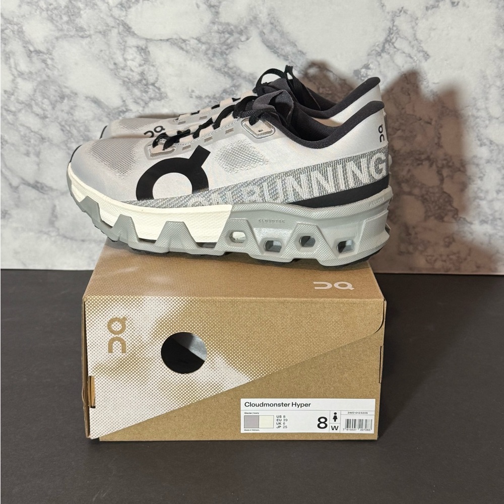 Women’s ON Cloudmonster Hyper gray and black sneakers